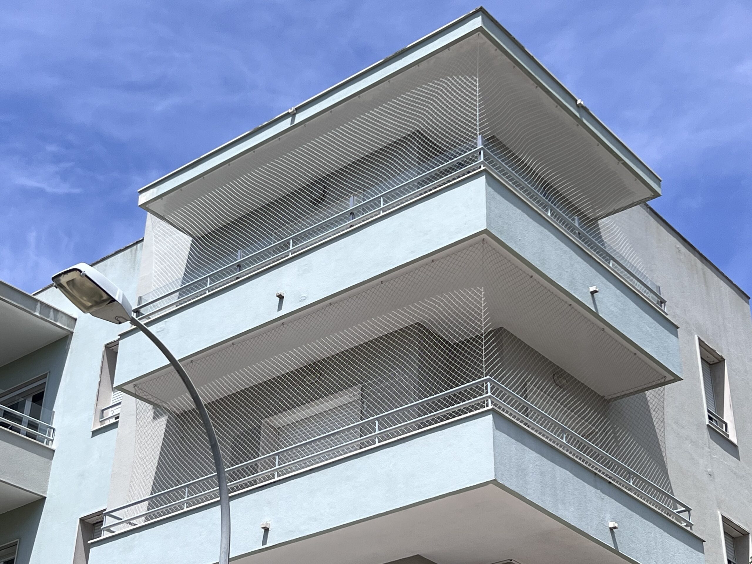 Instalação de rede de proteção em varanda em Oeiras