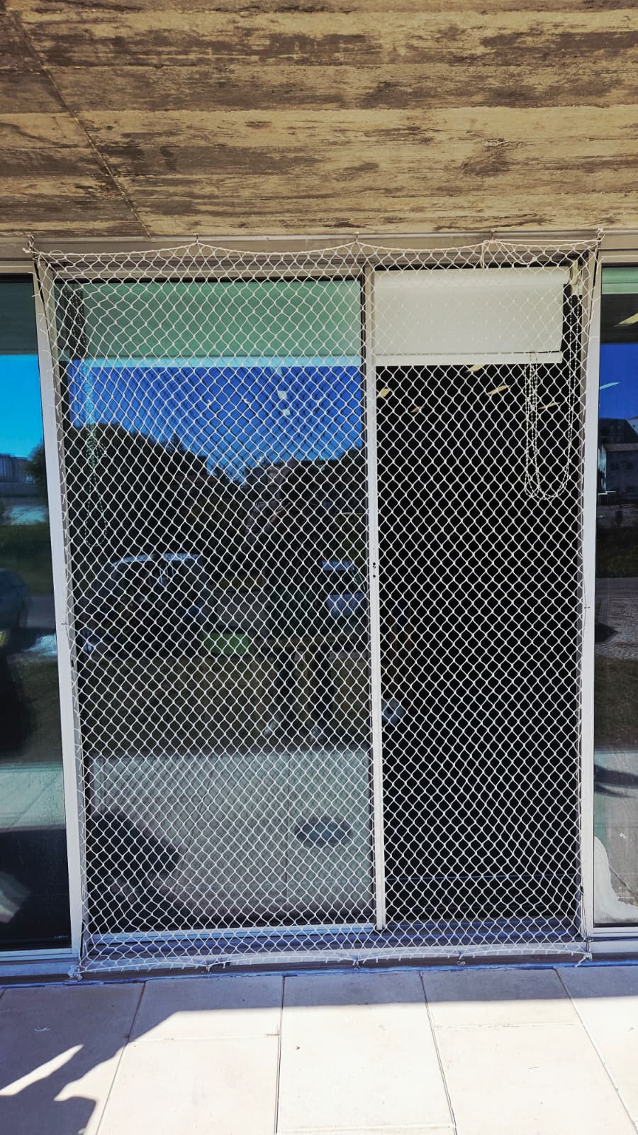 rede de segurança para janela em Almada protegendo crianças